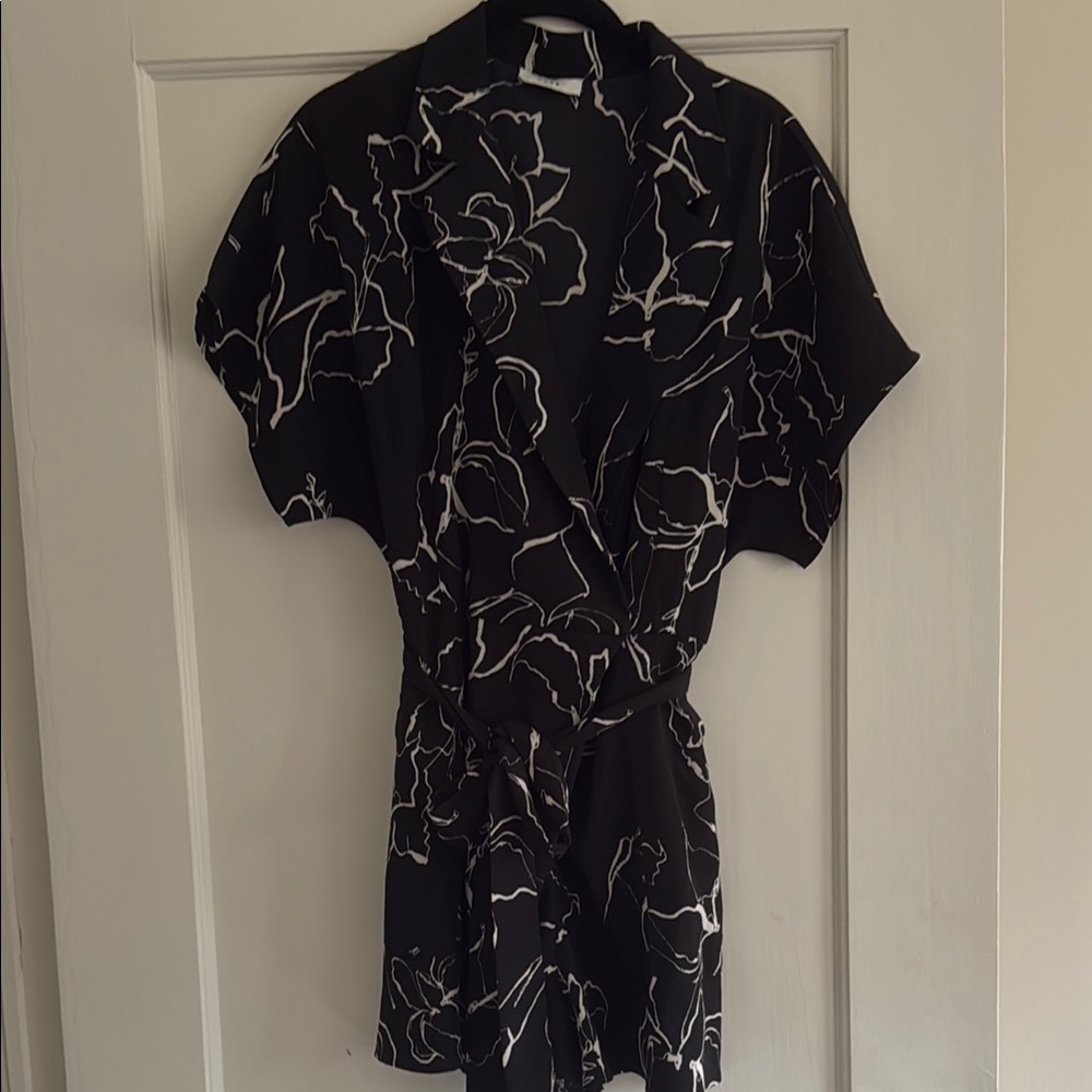 Lush Black romper with White Floral Design
